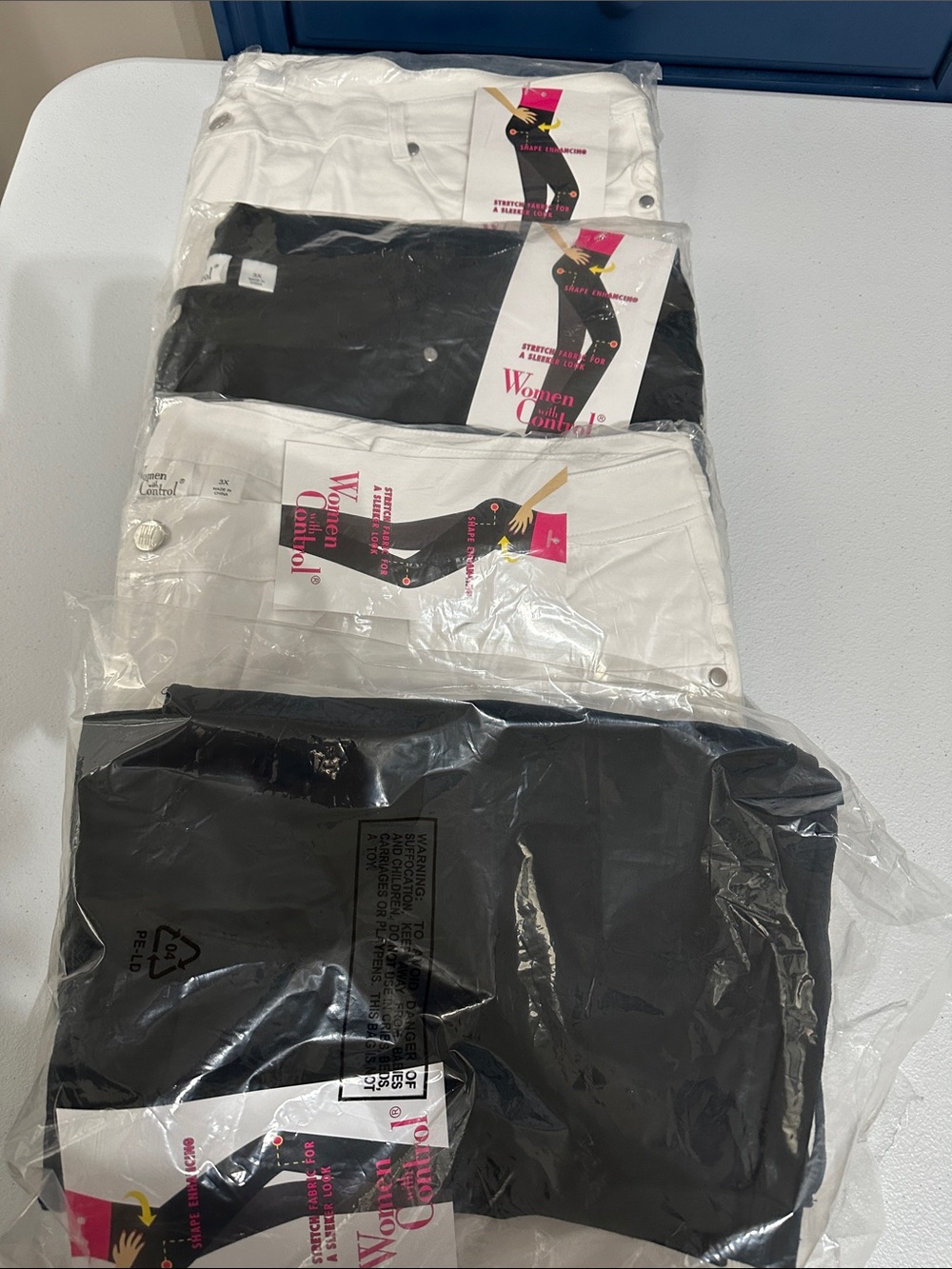 Big Bundle!!! Plus size Women with Control Black and Cream Stretch Capri’s